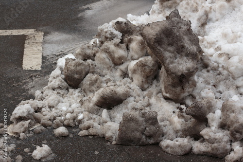 Canvas Print a huge pile of dirty snow on a new york city curb after a snowstorm