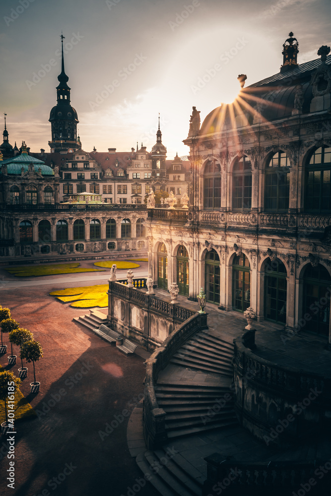 The Zwinger in Dresden in the morning. Nice shot from the edging and famous historical building from downtown Dresden. Reflection of an interesting look make up the photo