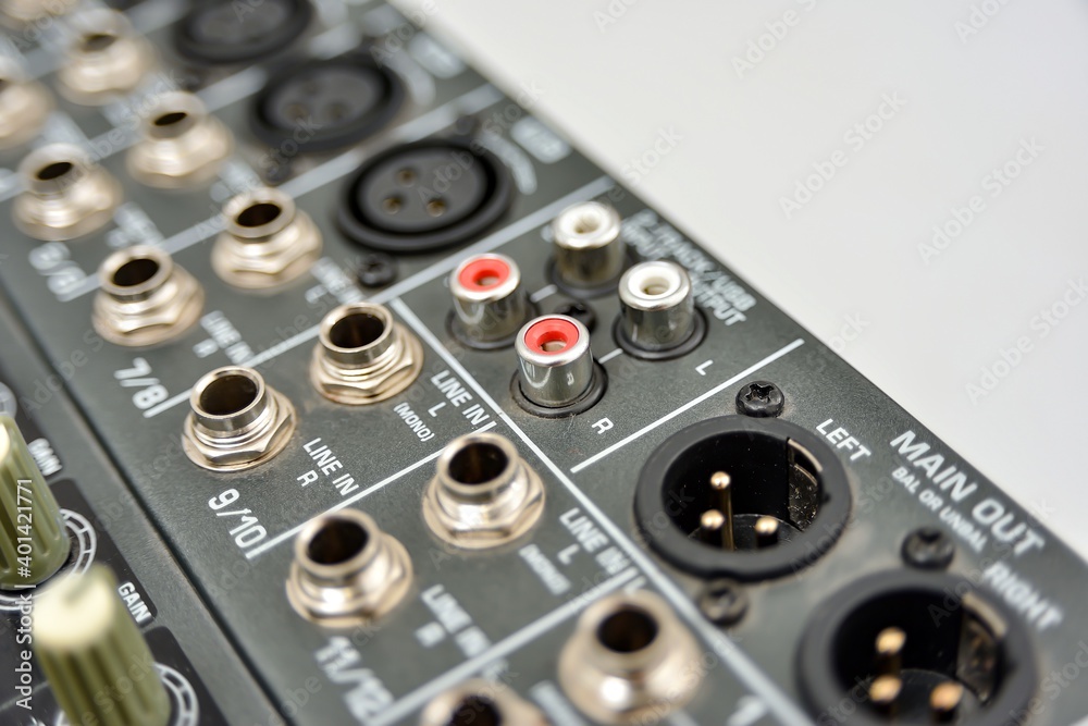 Audio line-in on a mixing console, close-up. Audio line-in on a mixing console, close-up.