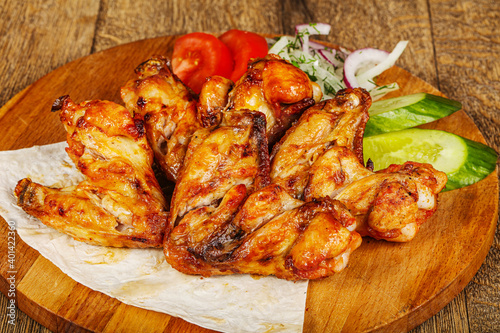 Chicken wings barbeque vith vegetables