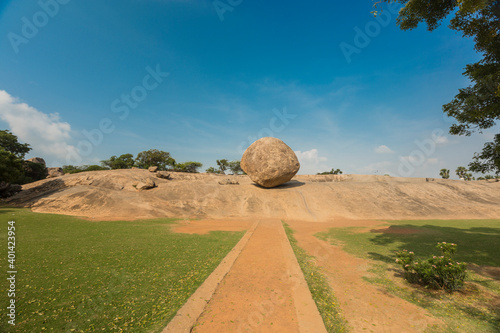Krishna's butterball, the giant natural balancing rock in Mahabalipuram, Tamil Nadu, India photo