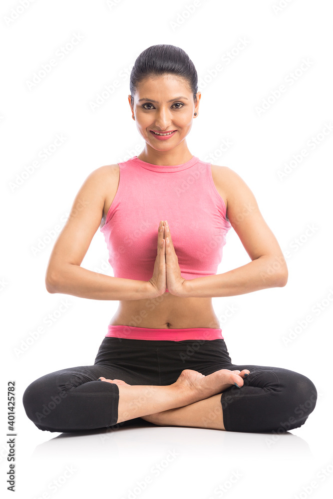 Beautiful young woman doing yoga isolated on white background. Beautiful young woman doing yoga isolated on white background.