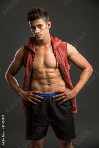 Young fitness man in studio shot