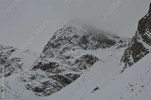 Highmountains covered in ice and snow photo