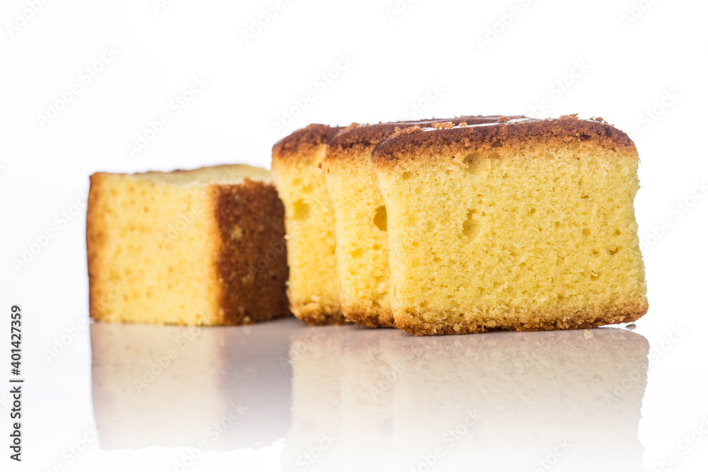 Butter cake sliced on white background