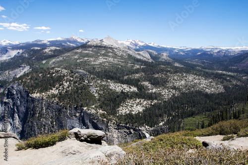 Amazing view of famous Yosemite Valley with rocks and river on a beautiful sunny day with blue sky in summer, Yosemite National Park, California, USA © romeof