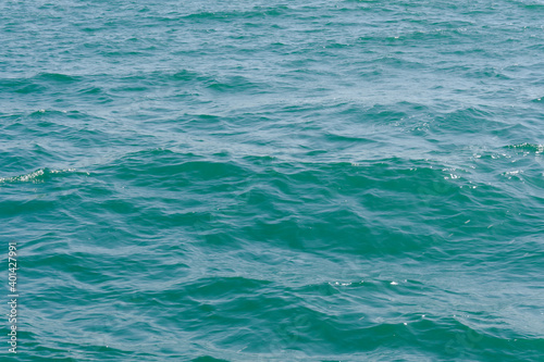 sea wave close up. Ripple on the surface background