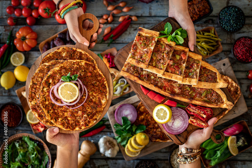 Traditional Turkish food, lahmacun and kiymali and kusbasili pide photo
