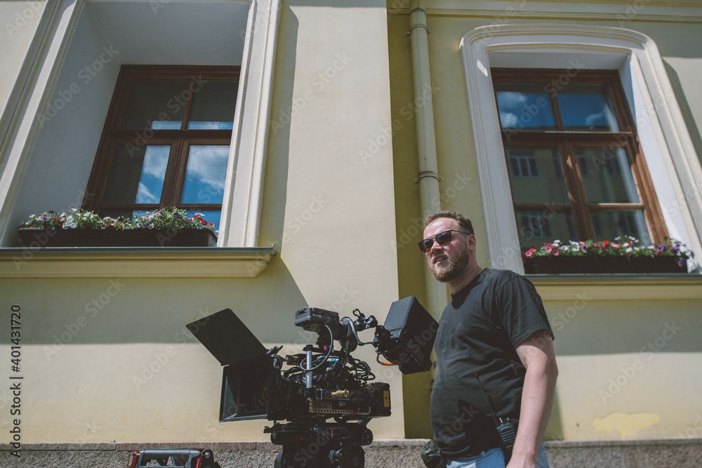 Director of photography with a camera in his hands on the set