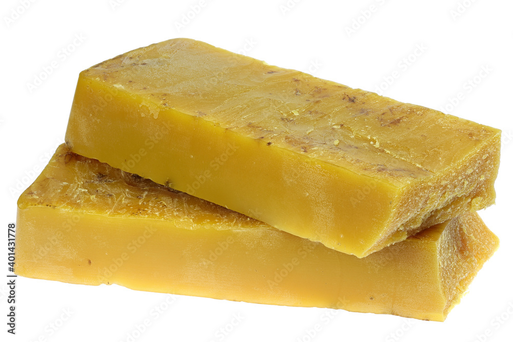 pure beeswax ingot isolated on white background pure beeswax ingot isolated on white background