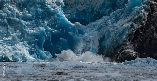Tracy Arm, Alaska is one of the few places in North America where glaciers still meet the sea. The Sawyer Glacier frequently calves ice into the arm.
