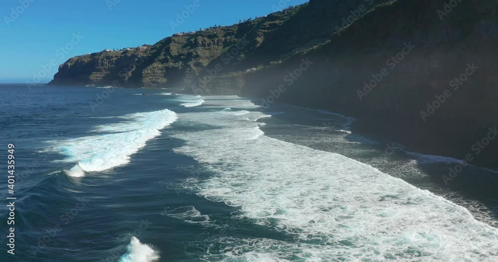 Aerial view. Flying Over Volcanic Coast And Waves, Tenerife. Aerial view. Flying Over Volcanic Coast And Waves, Tenerife.