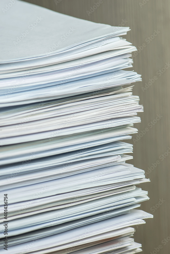 bundles bales of paper documents. stacks packs pile on the desk in the office bundles bales of paper documents. stacks packs pile on the desk in the office