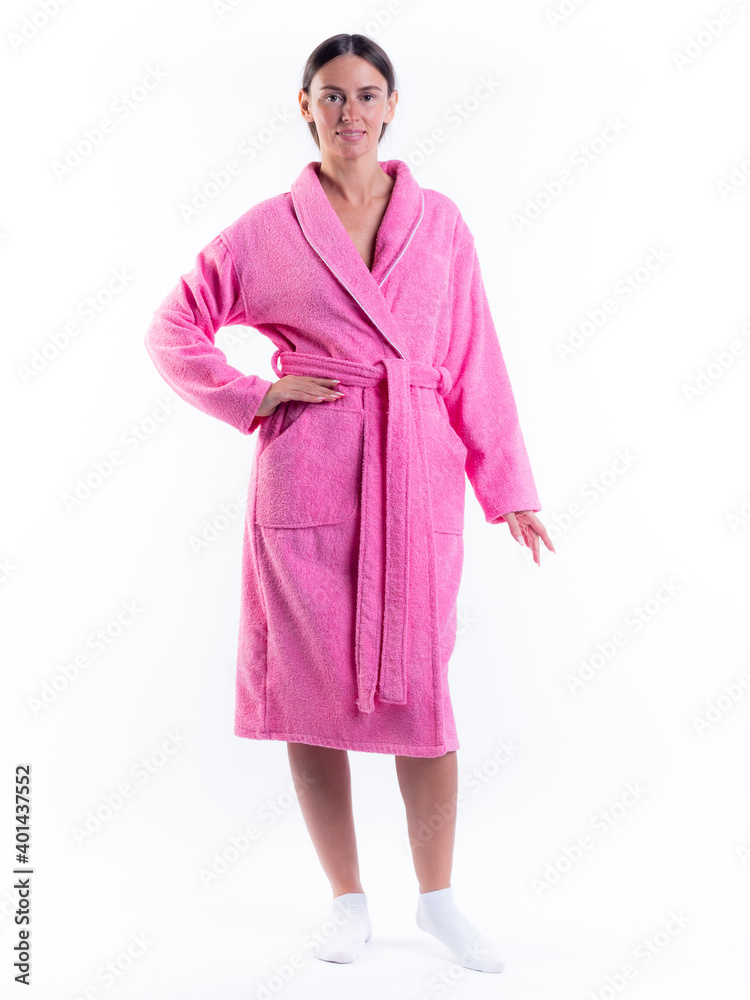 woman in a Bathrobe on an isolated white background with a smile on her face. woman in a Bathrobe on an isolated white background with a smile on her face.
