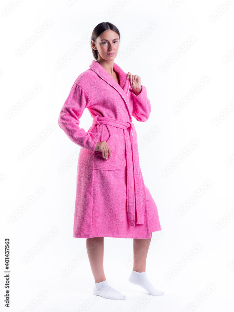 woman in a Bathrobe on an isolated white background with a smile on her face. woman in a Bathrobe on an isolated white background with a smile on her face.