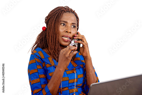 beautiful businesswoman on cellphone with laptop
