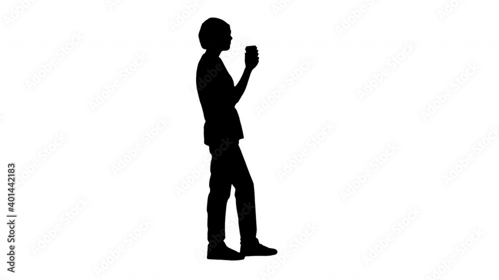 Silhouette Smiling female doctor or nurse in blue uniform having a coffee break. Silhouette Smiling female doctor or nurse in blue uniform having a coffee break.