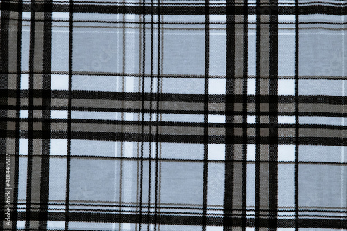 Blue horizontal and vertical stripe fabric texture pattern.