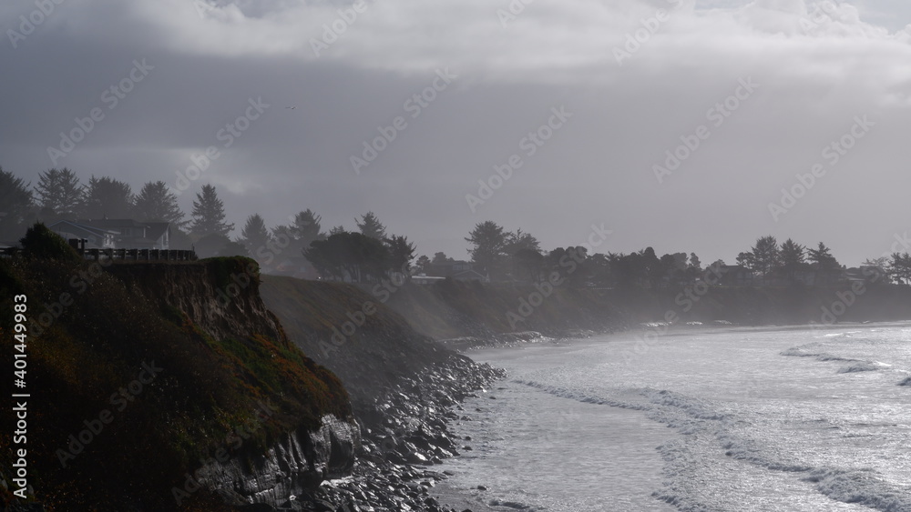 Mountain and sea landscape in a foggy day