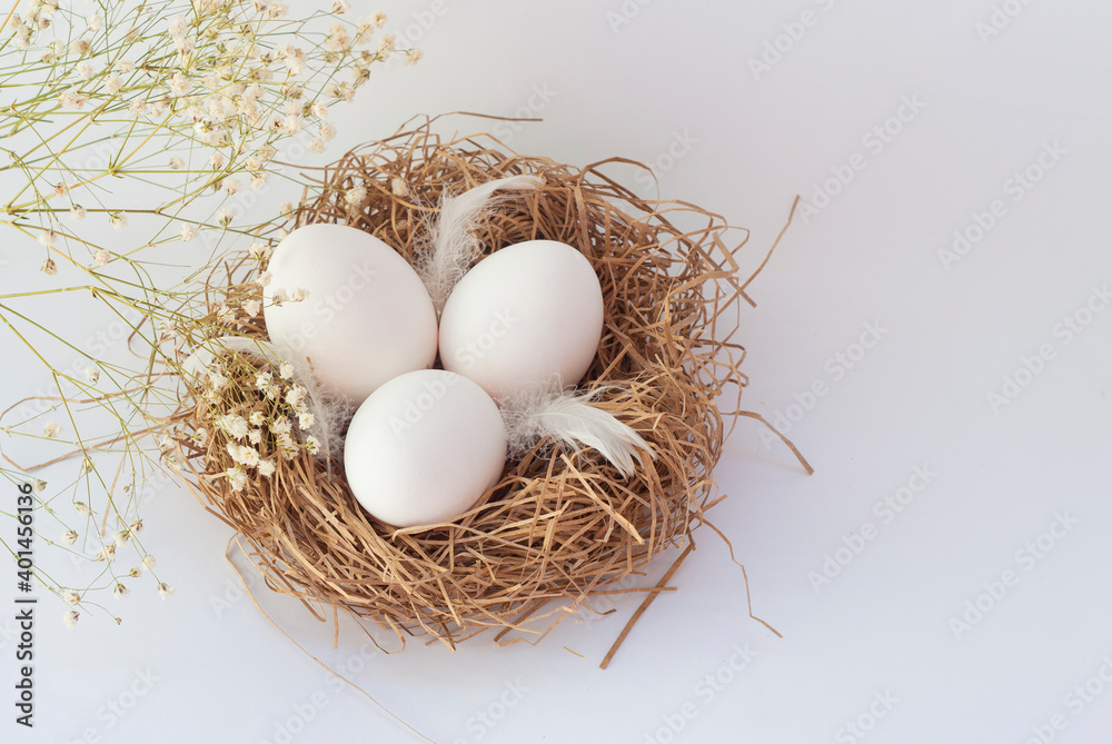 eggs in a decorative nest eggs in a decorative nest