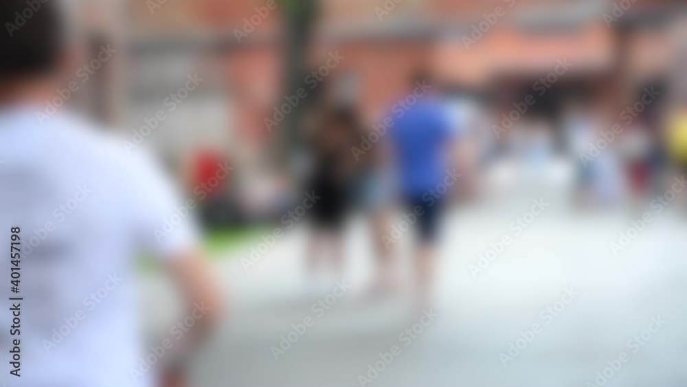 Blurred background. People walk on the street in summer day, Caucasian, Blurred background. People walk on the street in summer day, Caucasian,
