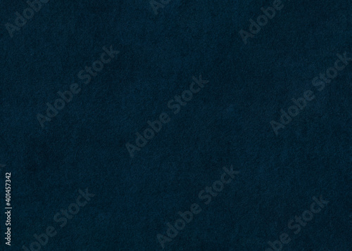 Paper texture cardboard background close-up. Dark and deep blue, grunge old paper surface texture