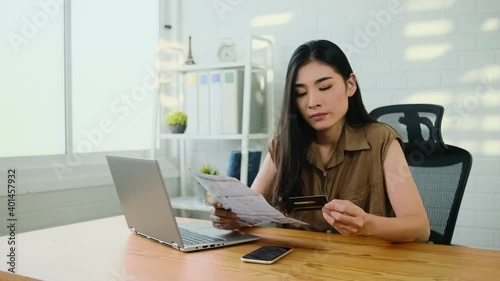 Shocked stressed young woman reading document letter from bank about loan debt financial problem, frustrated worried about bills notification, troubled with bad news or failed test results in mail