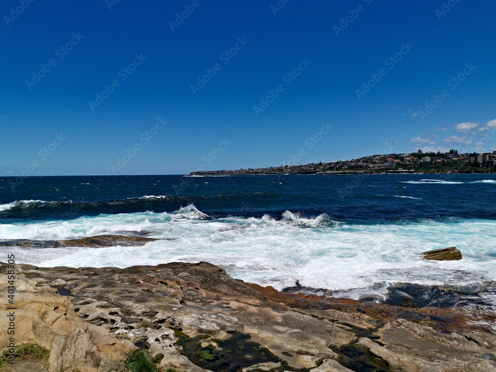 Stunning view of a deep blue sea from a coastal trail lookout, Sydney, New South Wales, Australia
Stunning view of a deep blue sea from a coastal trail lookout, Sydney, New South Wales, Australia