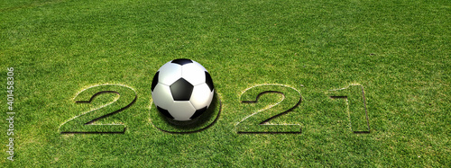 芝に浮きあがった2021の数字とサッカーボール © k_yu