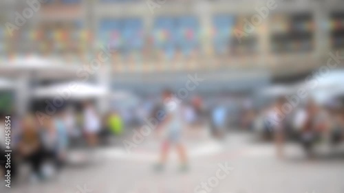 Wallpaper Mural Blurred background. People walking walk down the street at a festival Torontodigital.ca