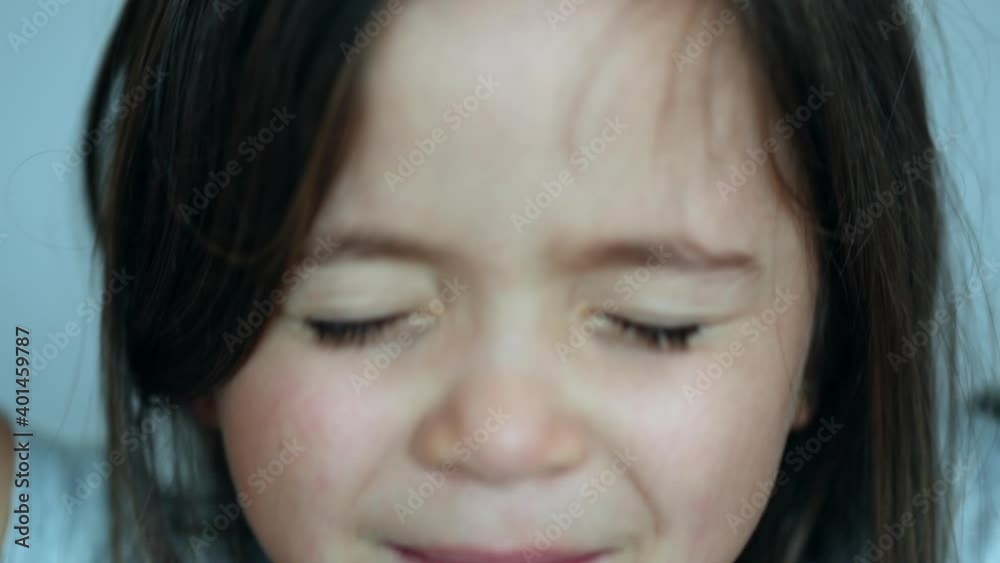 Little girl becoming sad by news. Kid changing emotions in disappointment Little girl becoming sad by news. Kid changing emotions in disappointment