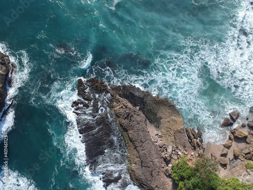 waves crashing on rocks