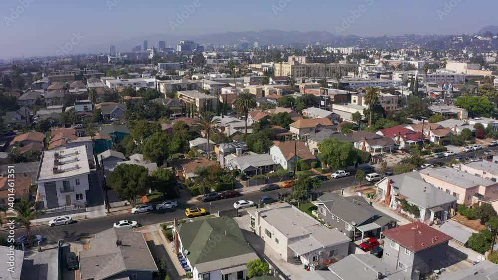 Aerial reverse shot of East Hollywood neighborhood. HD at 60 FPS. Aerial reverse shot of East Hollywood neighborhood. HD at 60 FPS.