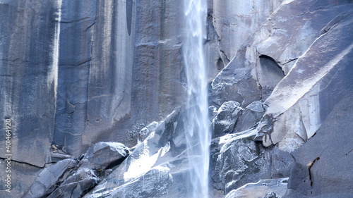 icicles on the rocks and waterfall
