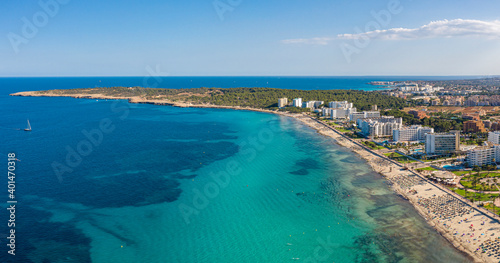 An aerial view on Cala Millor beach on a sunny day at Mallorca island in Spain