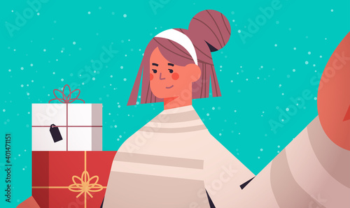 happy woman with gifts holding camera and taking selfie new year christmas holidays celebration concept horizontal portrait vector illustration