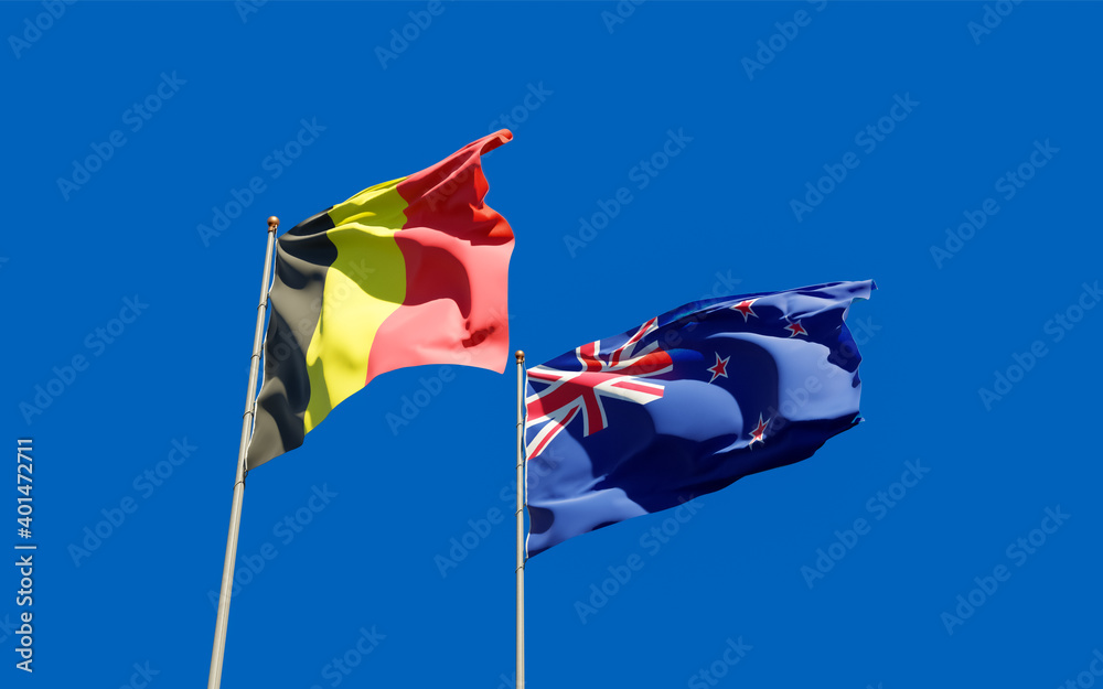 Flags of New Zealand and Belgium.