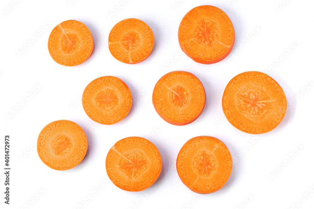 Fresh organic sliced of carrot isolated on white background. Top view. Flat lay. Fresh organic sliced of carrot isolated on white background. Top view. Flat lay.