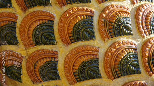 Design Fish scale ceramic tile in orange and green color texture