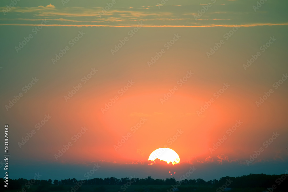 Colorful sunset in the evening sky. The nature and beauty of clouds