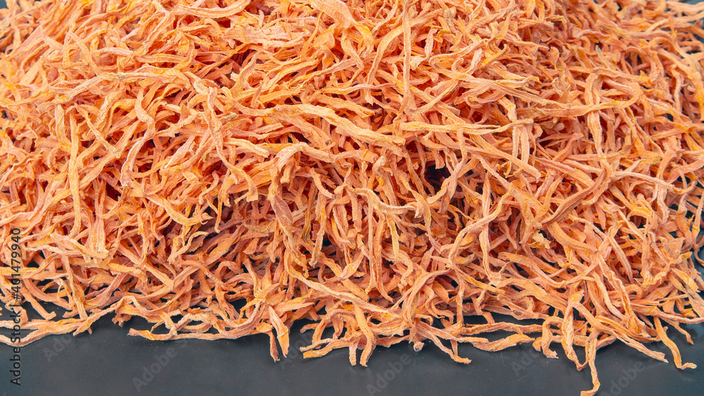 dried carrot slices. vegetables and vitamins. healthy food. food background and texture.