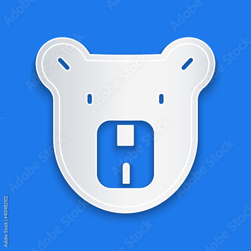 Paper cut Bear head icon isolated on blue background. Paper art style. Vector.