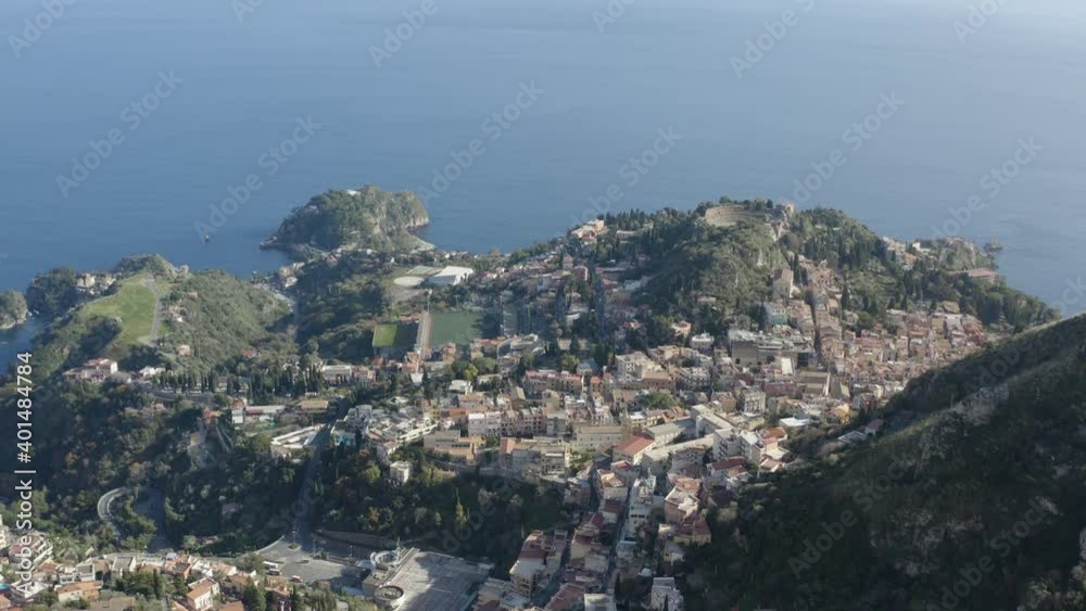 Taormina city in Sicily, Italy. Top view of the city with the Greek theater. Taormina city in Sicily, Italy. Top view of the city with the Greek theater.