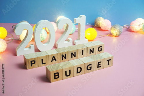 2021 Budget Planning alphabet letters on blue and pink background