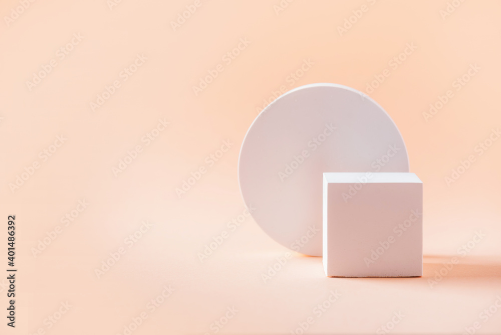 White geometric shapes podium for product display on beige background. Monochrome stage, stand for product promotion in minimal style. Copy space for your design. Banner White geometric shapes podium for product display on beige background. Monochrome stage, stand for product promotion in minimal style. Copy space for your design. Banner
