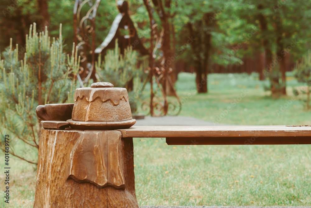 the circle of wood cut from a tree cake and a mug