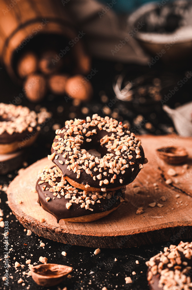 Chocolate nut donuts with beautiful home background - obrazy, fototapety, plakaty 