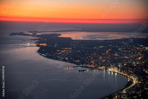 Vlora city seen from top during sunnset photo