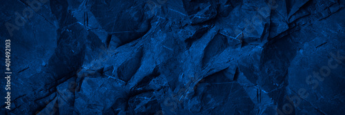 Panel kuchenny z motywem Abstract blue background. Toned monochrome stone rock texture background. Web banner. Wide. Dark blue rough surface background with space for design. Panoramic.