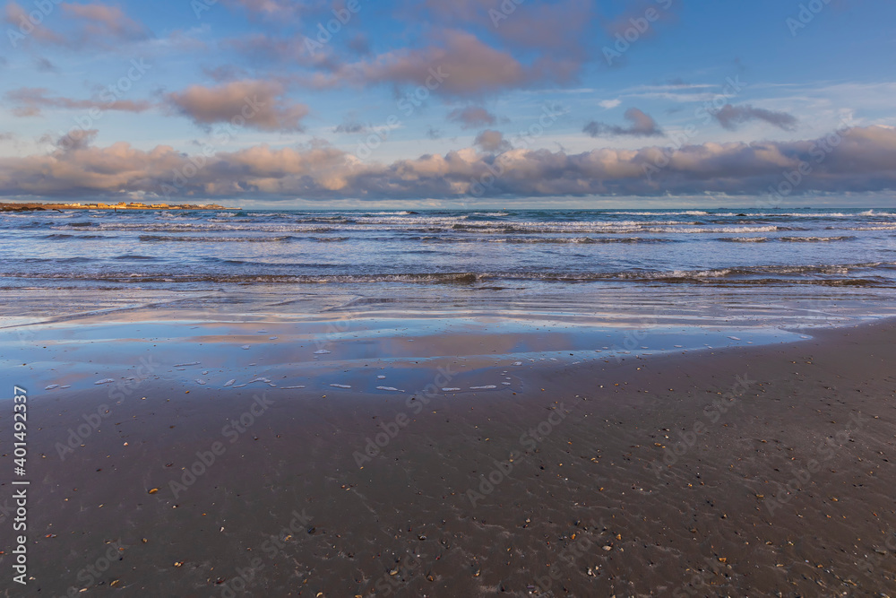Waves on the coast of the beach on a sunny day Waves on the coast of the beach on a sunny day